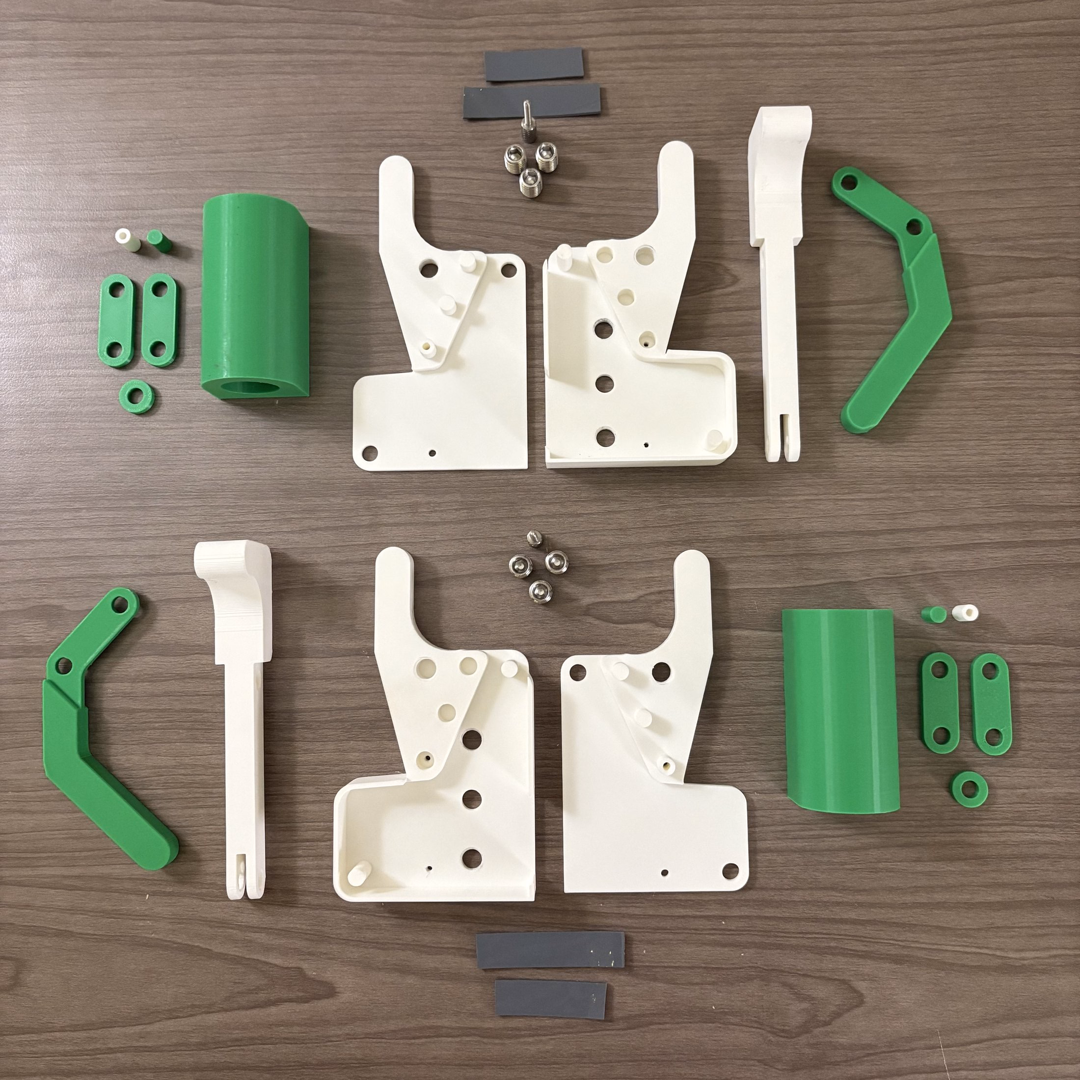 Exploded QuickClamp assembly showing the complete part set and fasteners